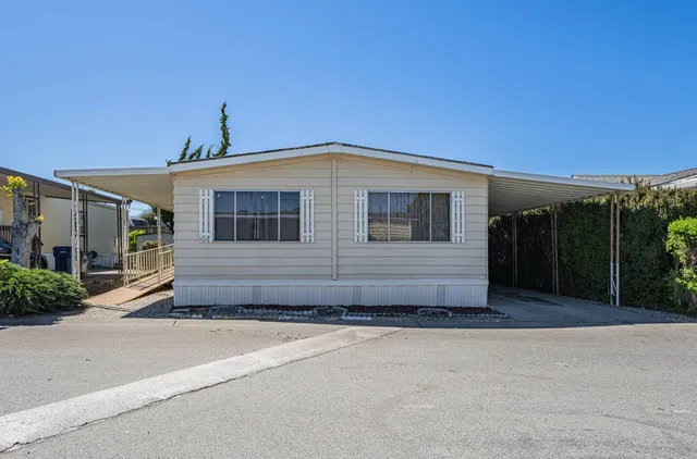 a front view of a house with a garage