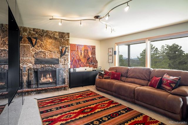 a bedroom with a bed and a book shelf
