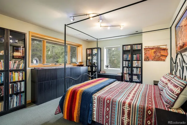 a view of a kitchen with workspace and windows
