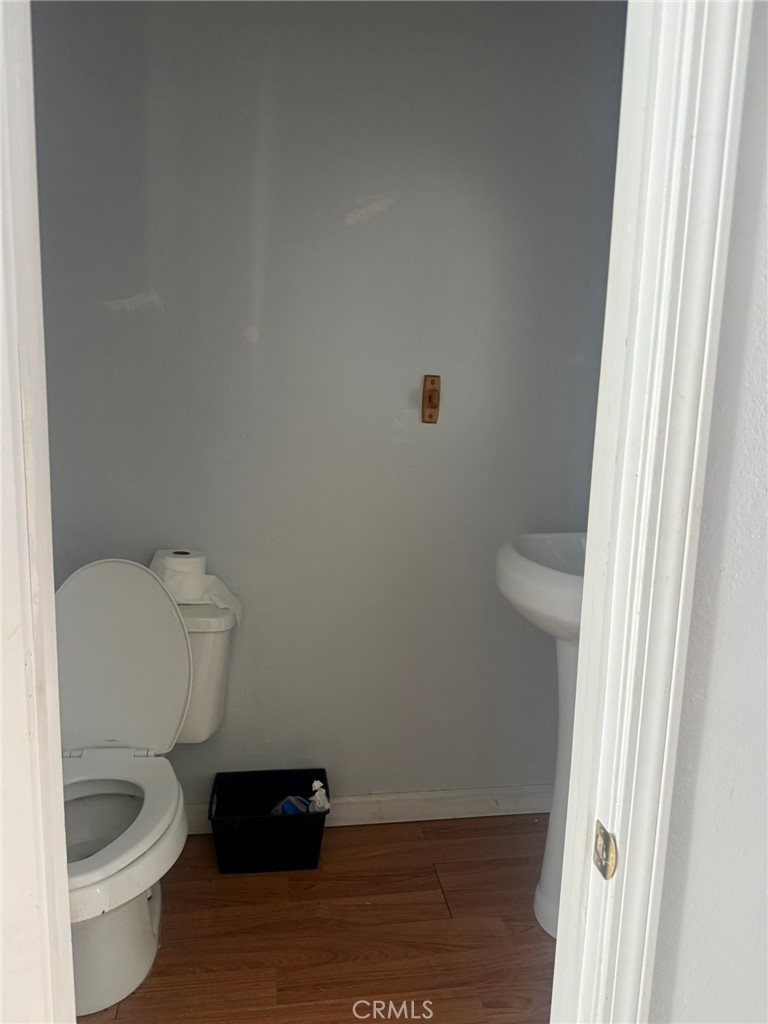 6845 Floyd Way Nice, CA 95464 - Photo 11 of 59 a bathroom with a toilet and a sink