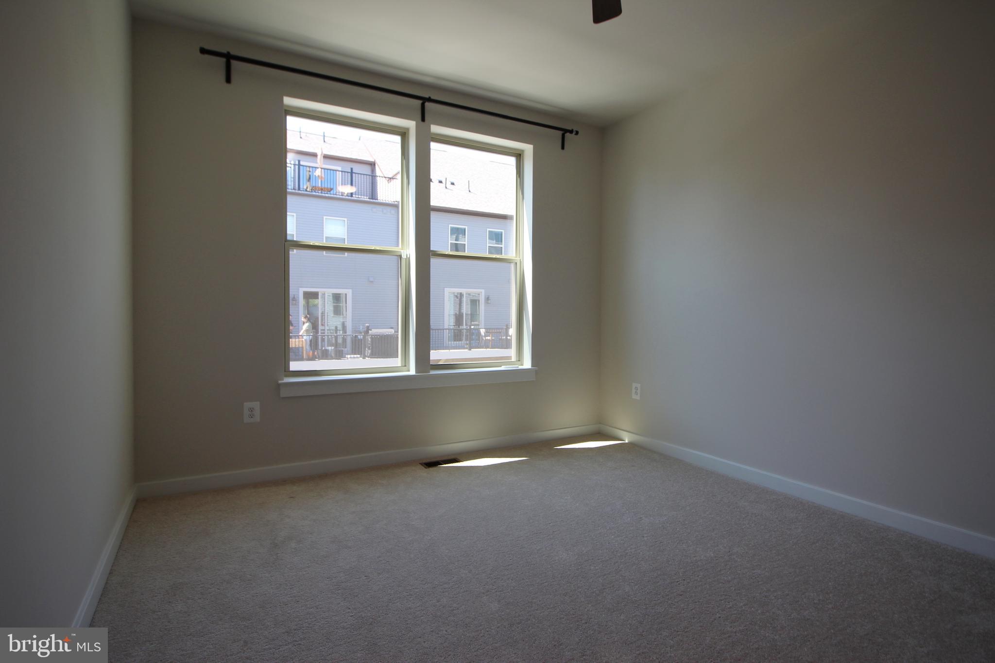 2154 Glacier Road, Unit 67 Herndon, VA 20170 - Photo 23 of 30 an empty room with a window