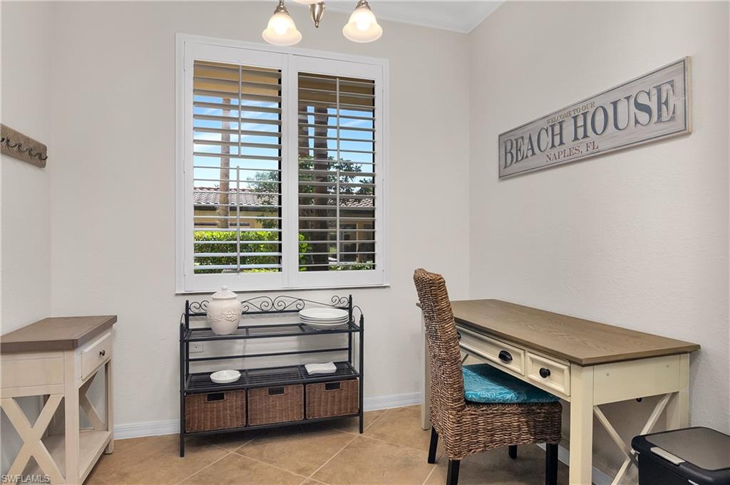 9719 Acqua Court, Unit 214 Naples, FL 34113 - Photo 15 of 50 a view of an empty room with a window