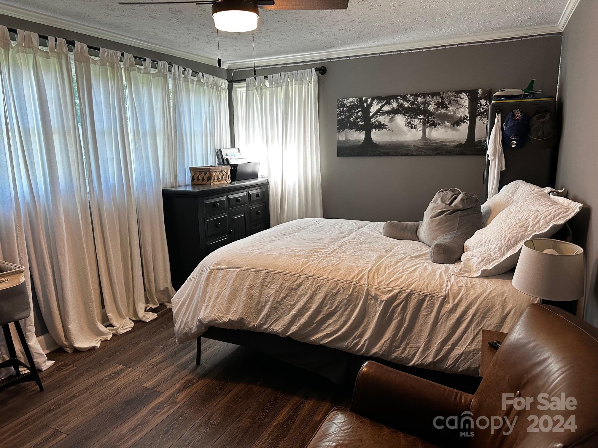 303 Legion Road Hudson, NC 28638 - Photo 13 of 32 a bedroom with a bed and a window