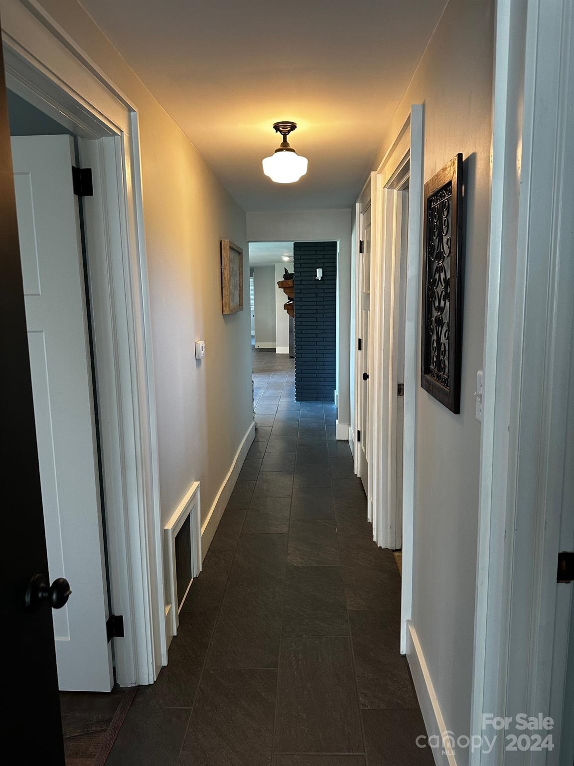 303 Legion Road Hudson, NC 28638 - Photo 19 of 32 a view of hallway with stairs