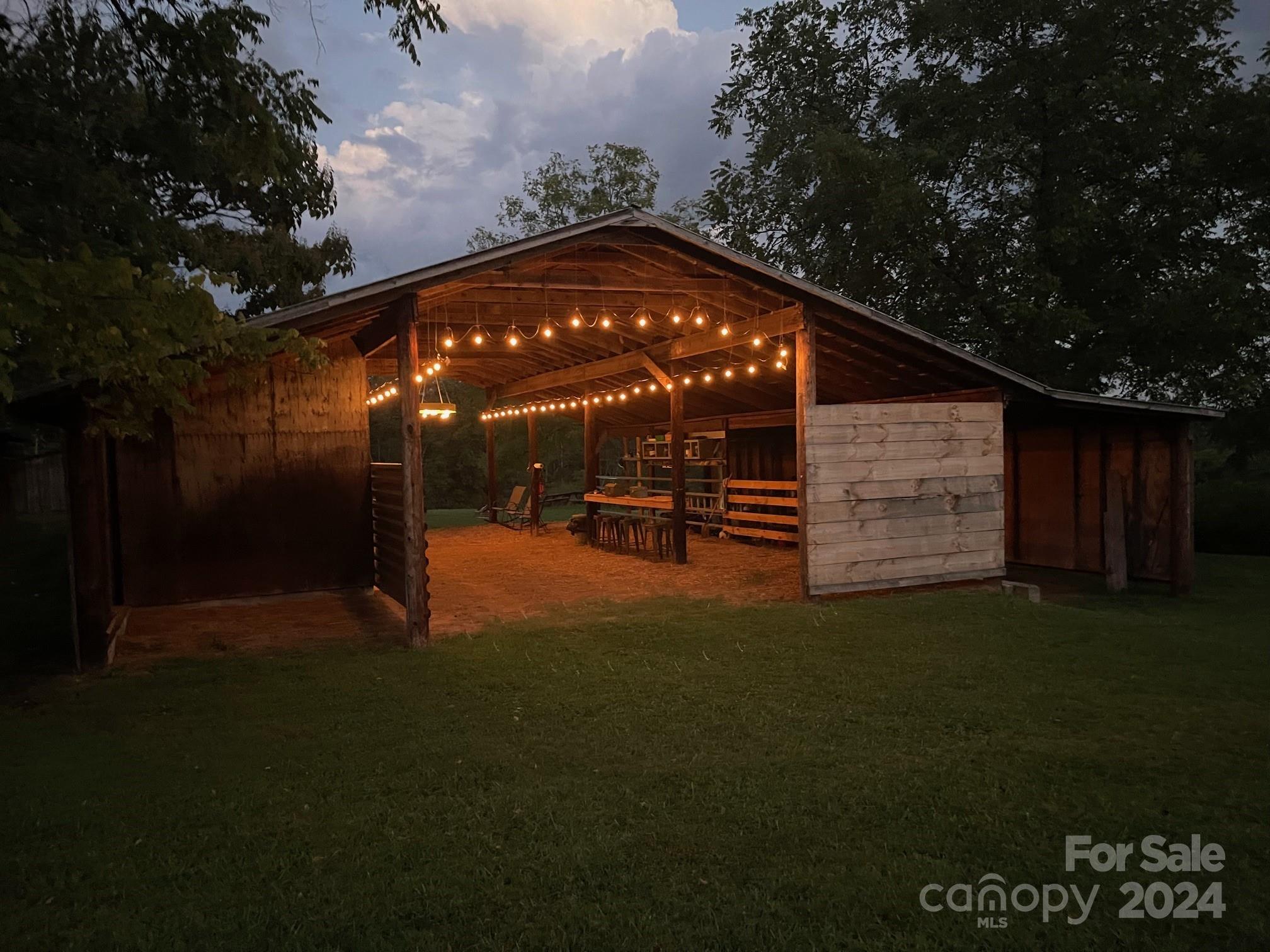 303 Legion Road Hudson, NC 28638 - Photo 2 of 32 a view of outdoor space and garden