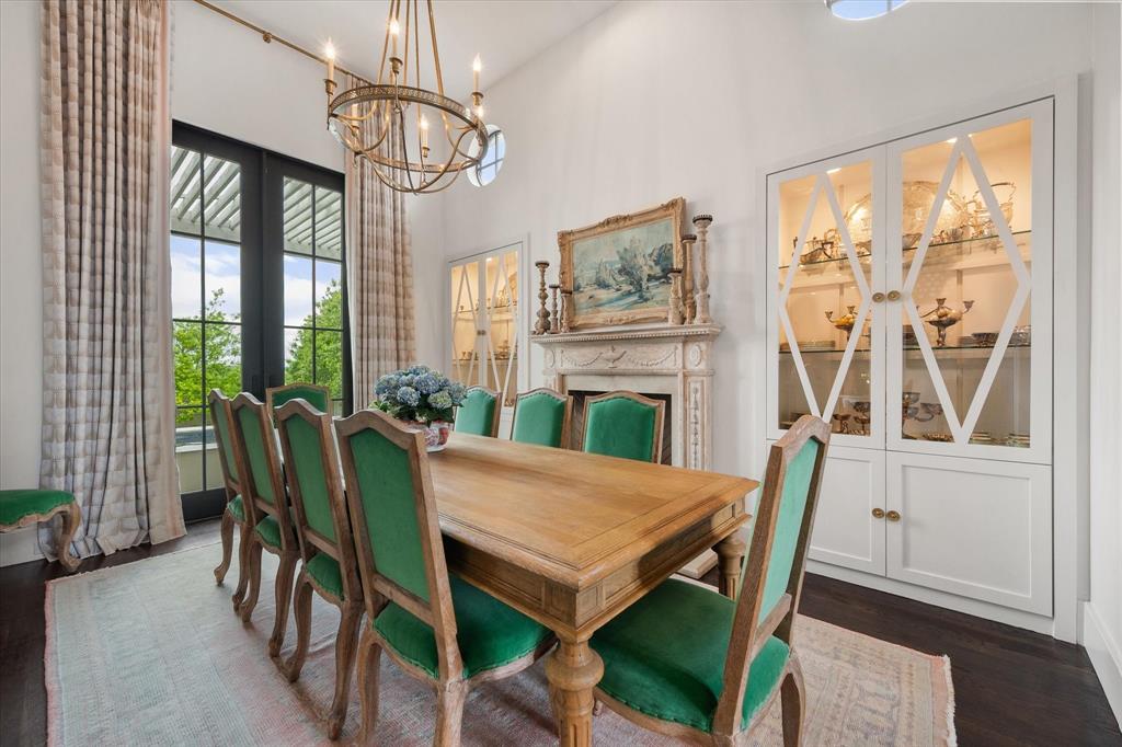 3824 Bishops Flower Road Fort Worth, TX 76109 - Photo 7 of 38 a view of a dining room with furniture a chandelier and wooden floor