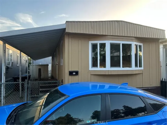 a view of a house with a swimming pool