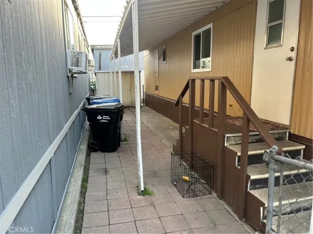 a view of an chairs and tables in the balcony