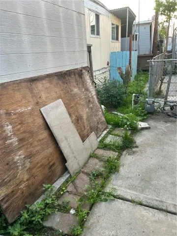 a view of a back yard of the house