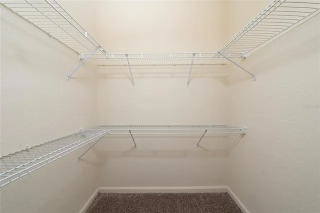 a view of a room with racks on the wall