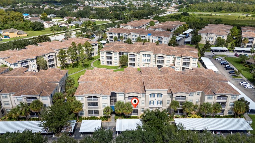 3001 Greystone Loop, Unit 103 Kissimmee, FL 34741 - Photo 2 of 31 an aerial view of multiple houses