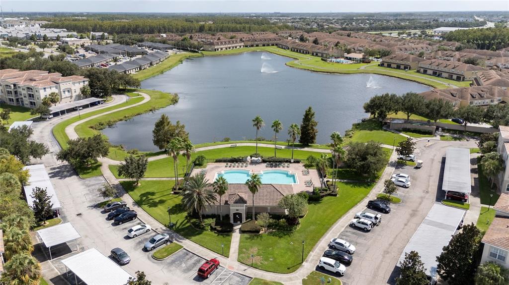 3001 Greystone Loop, Unit 103 Kissimmee, FL 34741 - Photo 29 of 31 an aerial view of a house with a swimming pool yard and outdoor seating