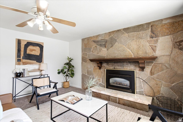 1341 29th Street Ogden, UT 84403 - Photo 6 of 37 Stone fireplace featuring a decorative wood mantel and a gas insert