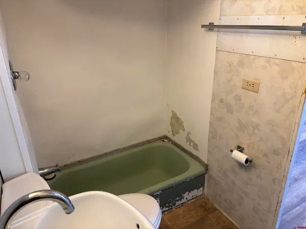 a bathroom with a sink and a toilet