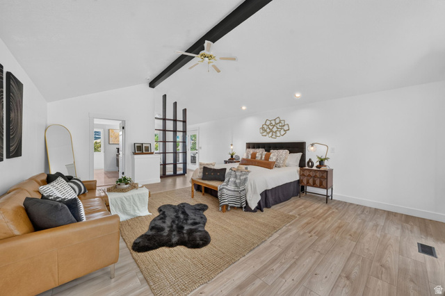 1979 Cave Hollow Way Bountiful, UT 84010 - Photo 25 of 59 Spacious room featuring vaulted ceilings with exposed dark beams, wood-finish flooring, and recessed lighting