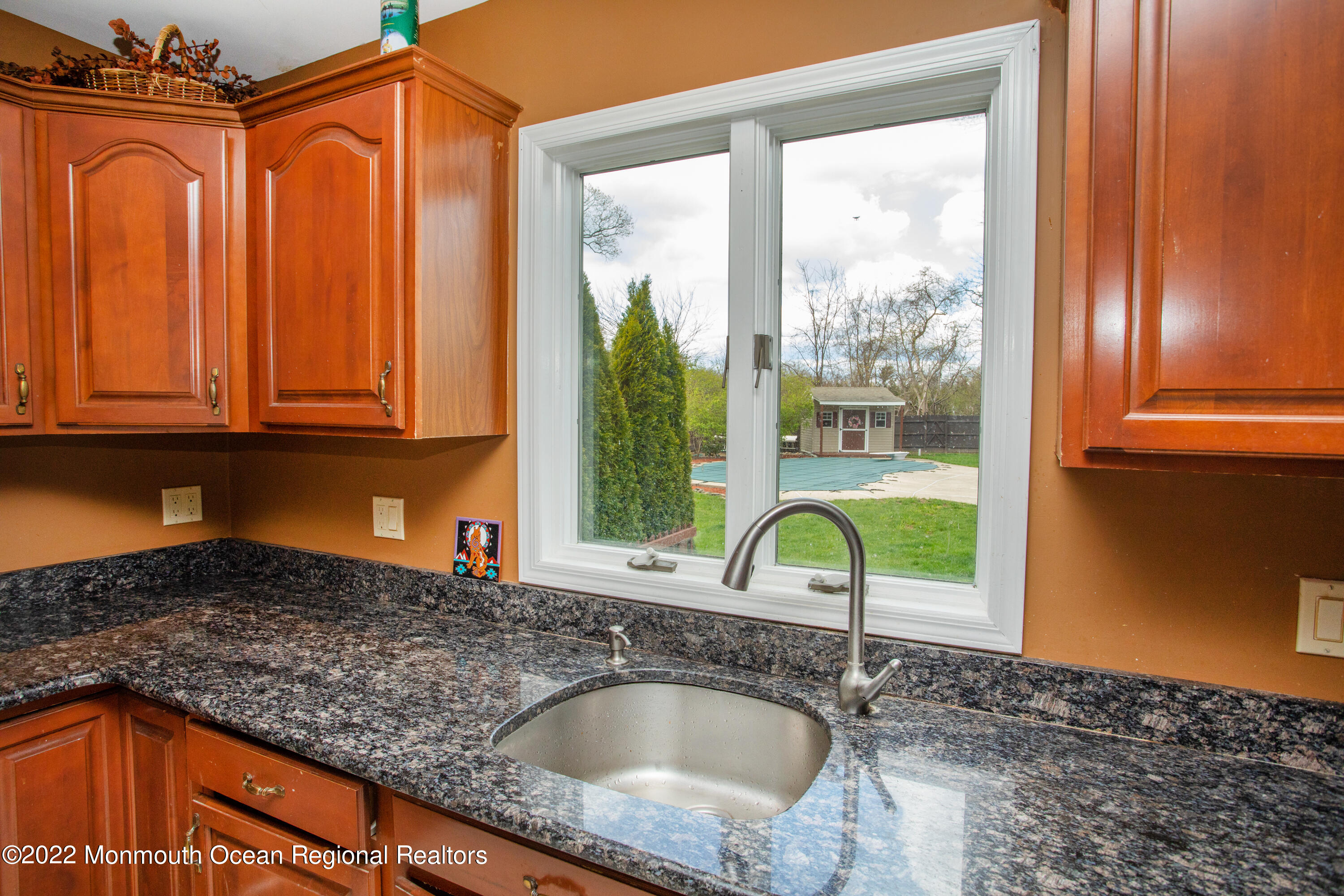2606 Woolley Road Wall, NJ 07719 - Photo 15 of 47 a kitchen with sink a window and furniture