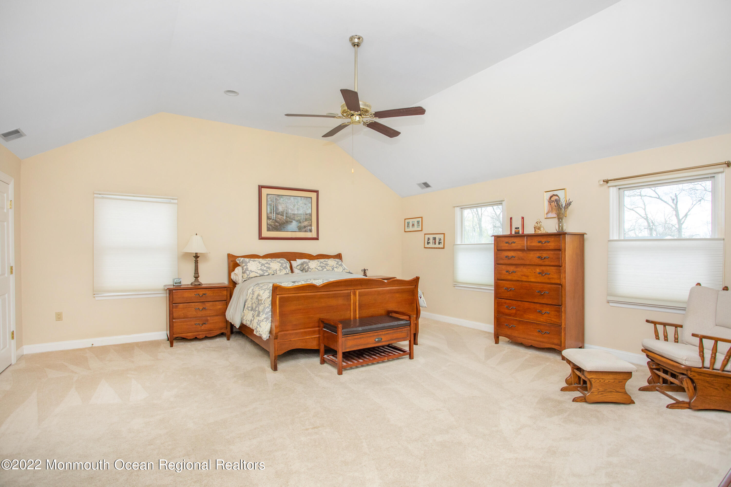 2606 Woolley Road Wall, NJ 07719 - Photo 20 of 47 a spacious bedroom with a bed and a cabinets