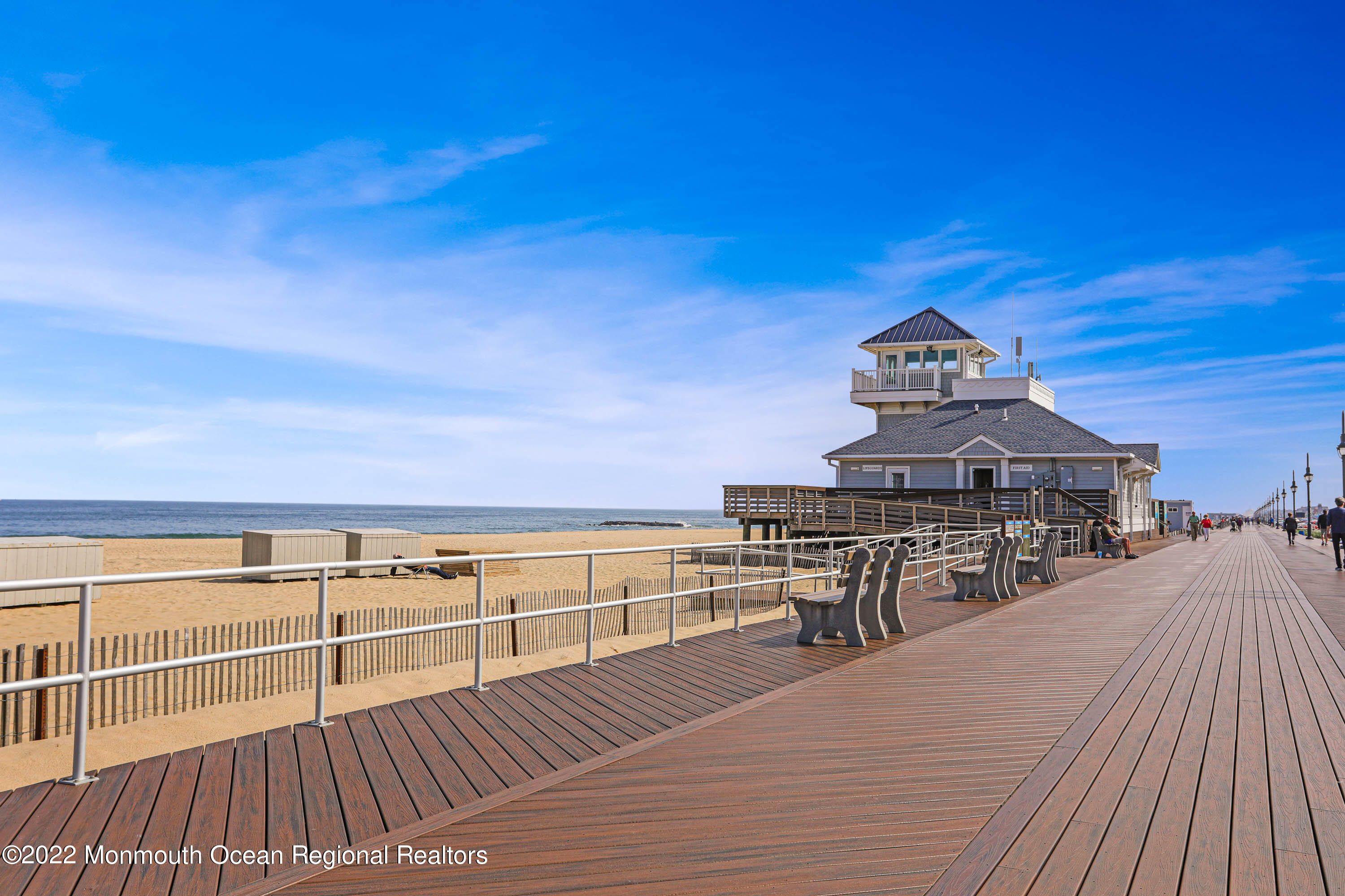 2606 Woolley Road Wall, NJ 07719 - Photo 41 of 47 a view of a roof deck with chair and wooden floor