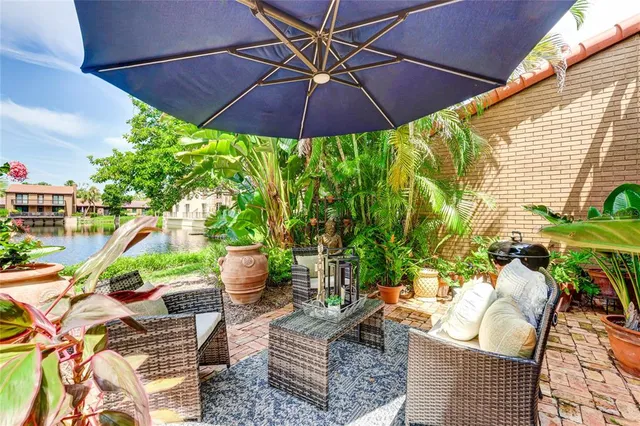 a view of a backyard with swimming pool