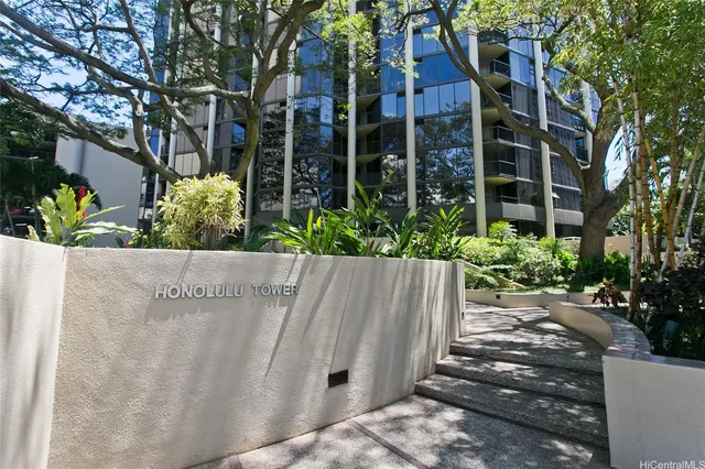 front view of a house with a garden