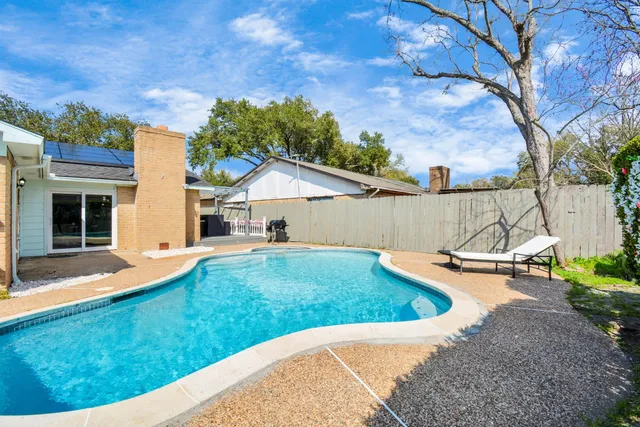 a view of outdoor space yard and swimming pool
