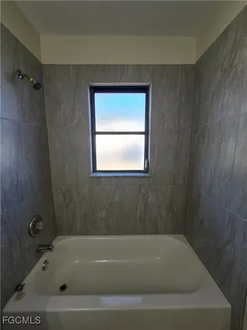 a bathroom with a bathtub