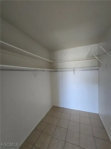 a view of an empty walk in closet