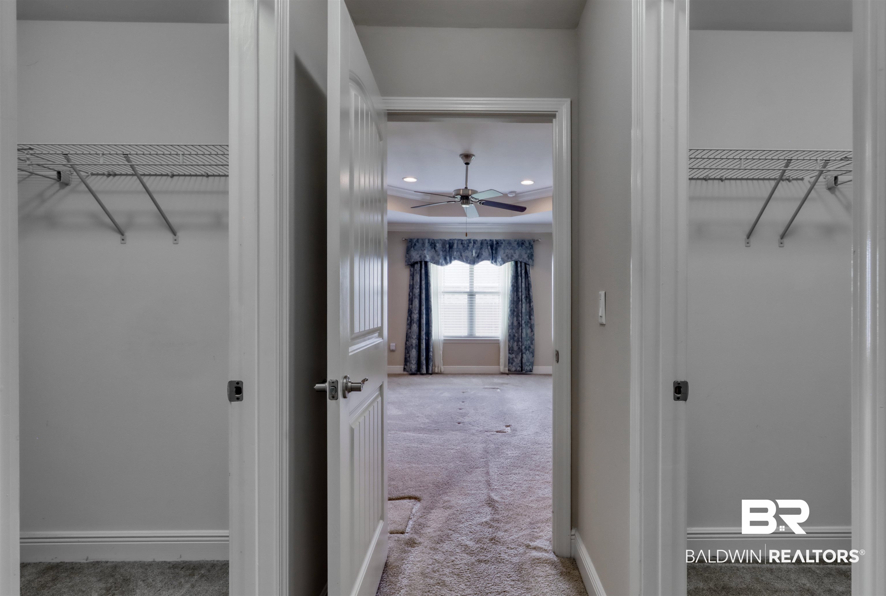 14794 Troon Drive Foley, AL 36535 - Photo 14 of 33 Corridor featuring recessed lighting, carpet flooring, a raised ceiling, and baseboards