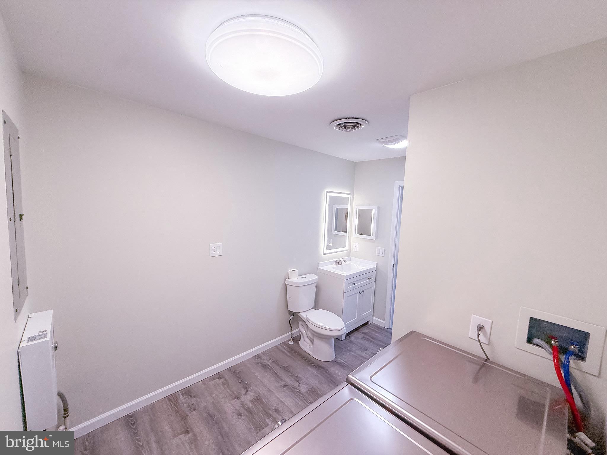 18558 Oak Road Bridgeville, DE 19933 - Photo 16 of 36 Bright and modern laundry space with utility.