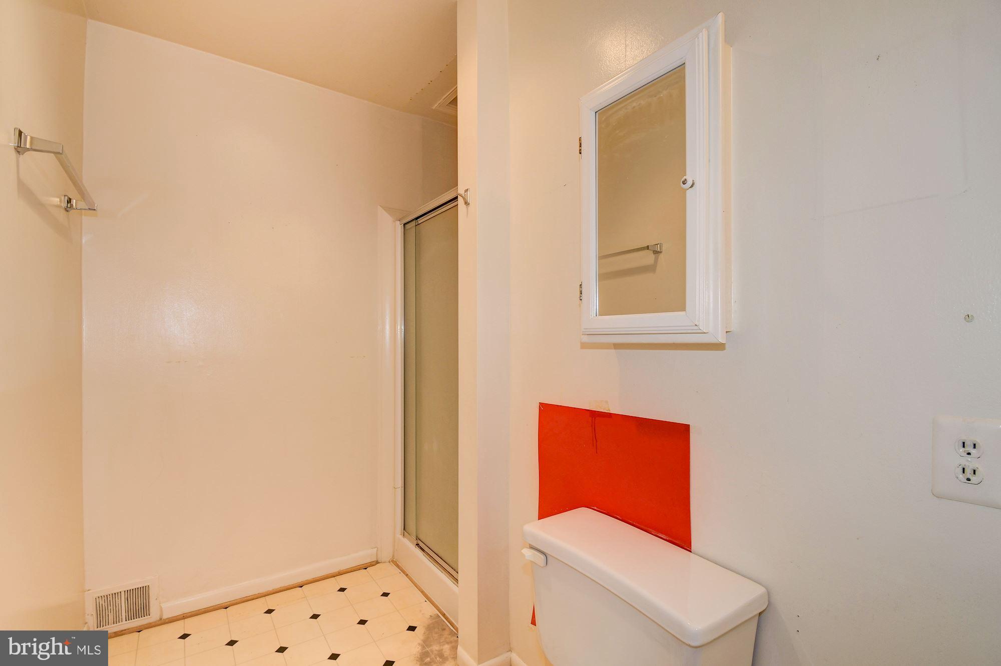1218 Portner Road Alexandria, VA 22314 - Photo 25 of 31 a room with a window and a potted plant