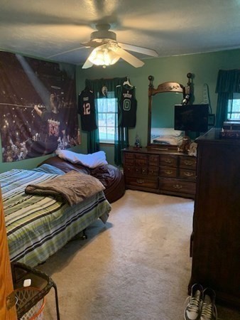 87 Oxford Road Charlton, MA 01507 - Photo 12 of 22 a bedroom with a bed dresser with chair and window