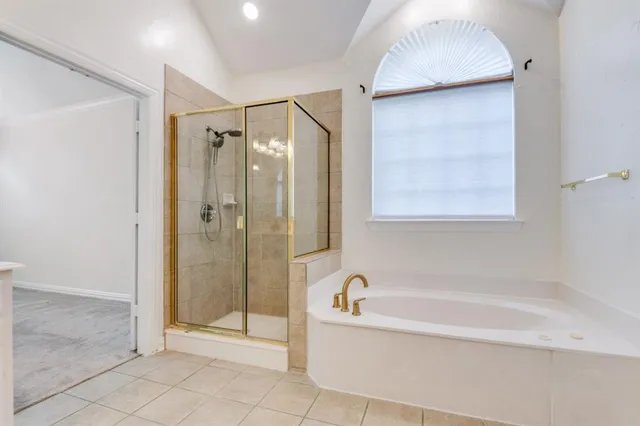 a bathroom with a sink a toilet and bathtub