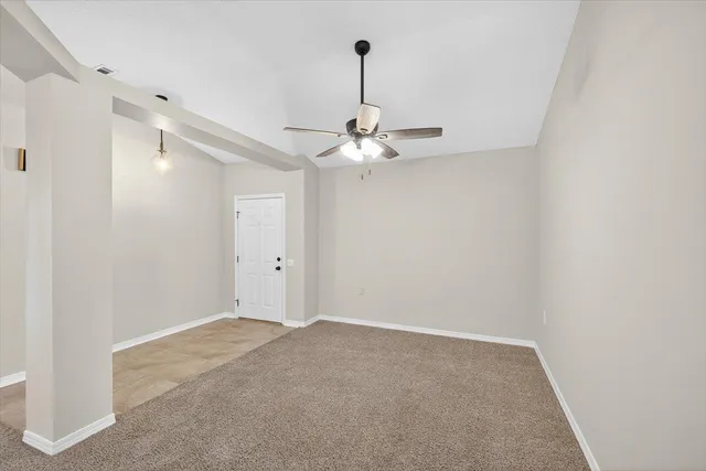a view of kitchen with windows