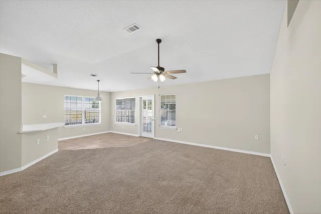 a kitchen with stainless steel appliances white cabinets and a sink