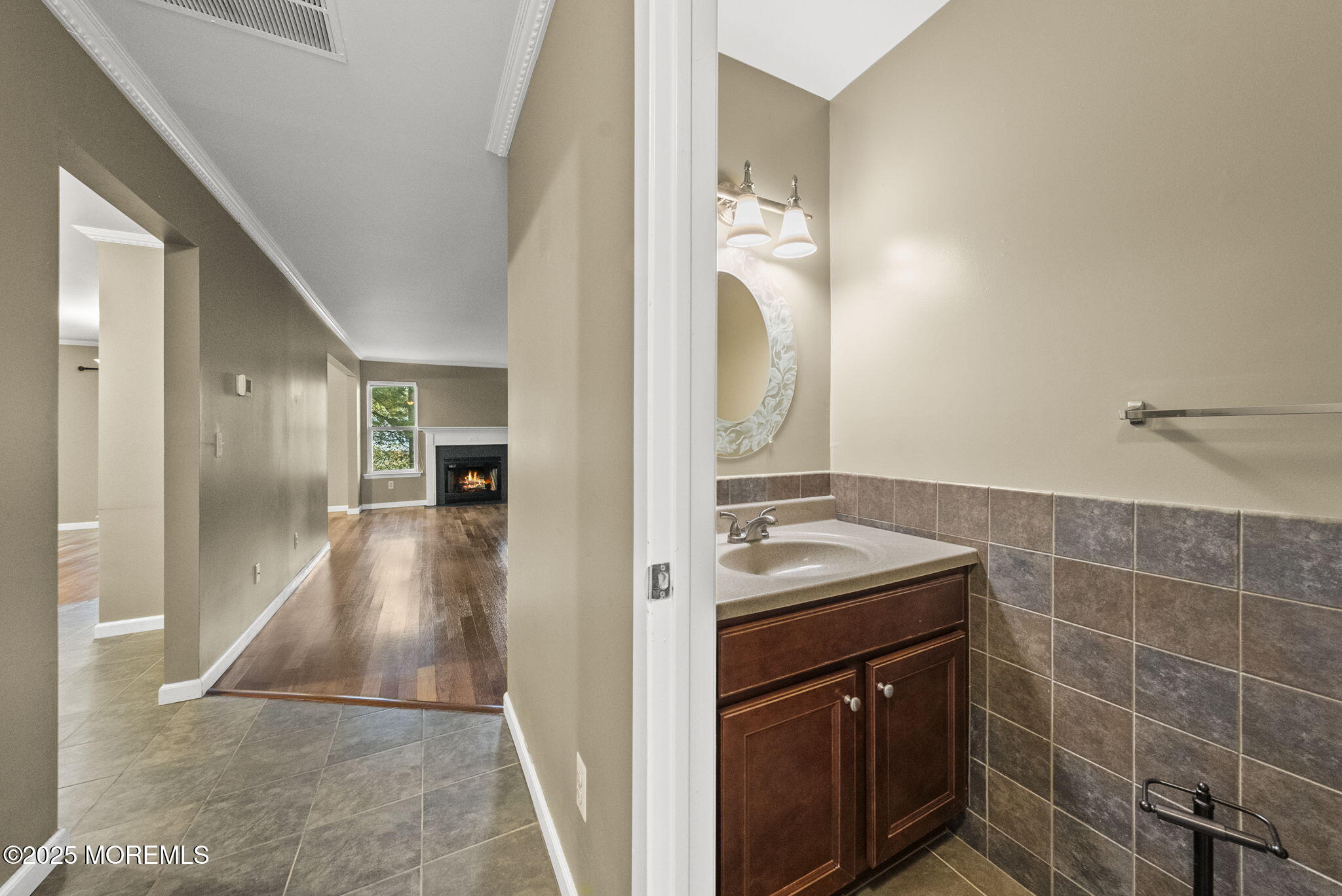 63 Atrium Way, Unit 63 Manalapan, NJ 07726 - Photo 16 of 40 a bathroom with a sink a toilet and shower