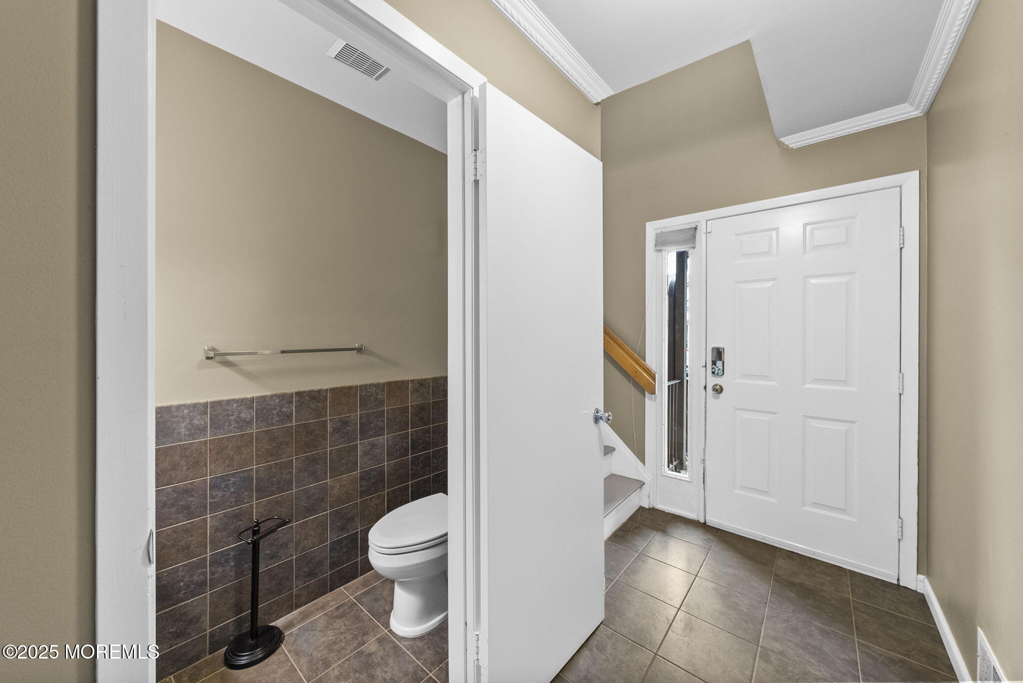 63 Atrium Way, Unit 63 Manalapan, NJ 07726 - Photo 17 of 40 a bathroom with a toilet