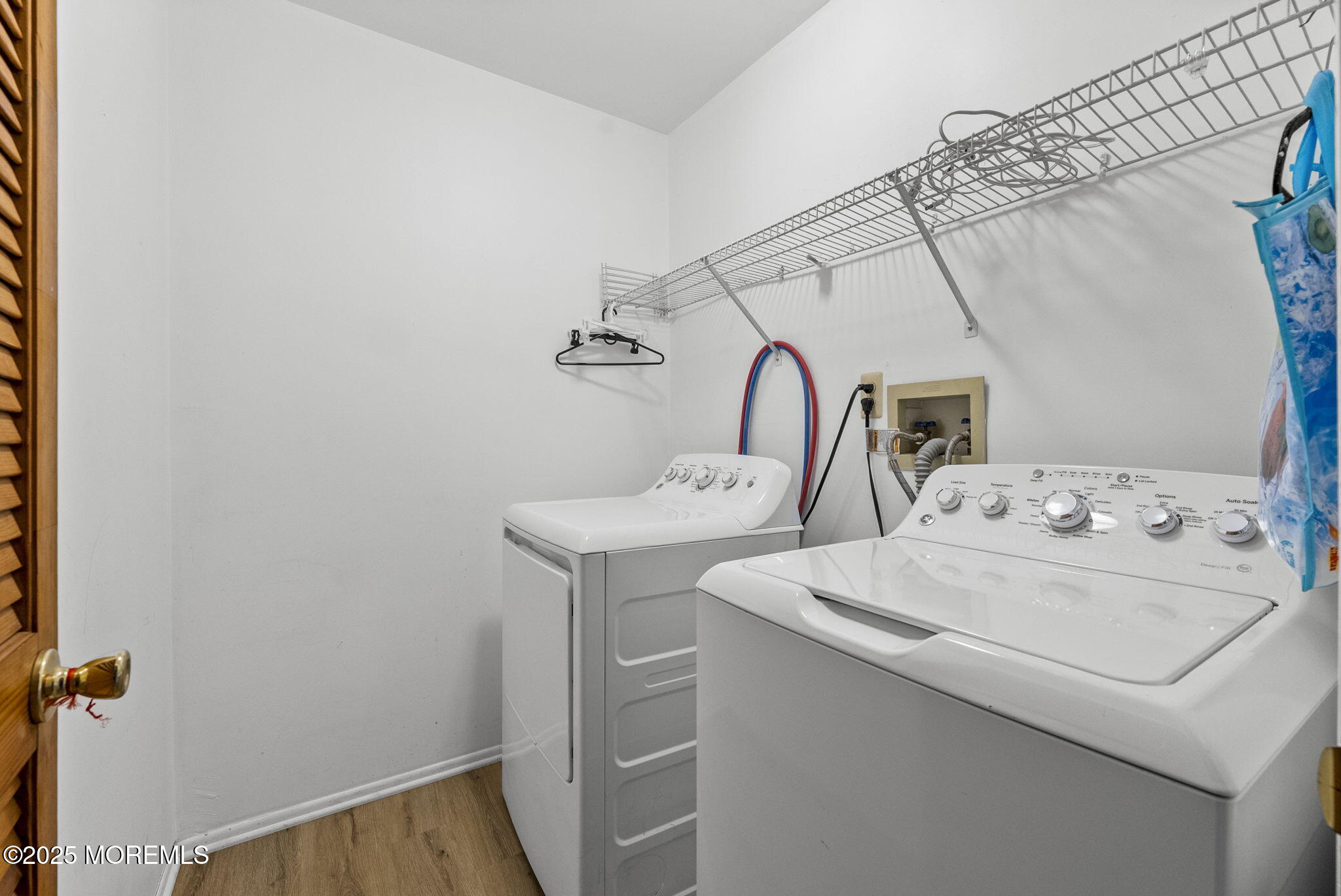 63 Atrium Way, Unit 63 Manalapan, NJ 07726 - Photo 27 of 40 a bathroom with a sink and a mirror