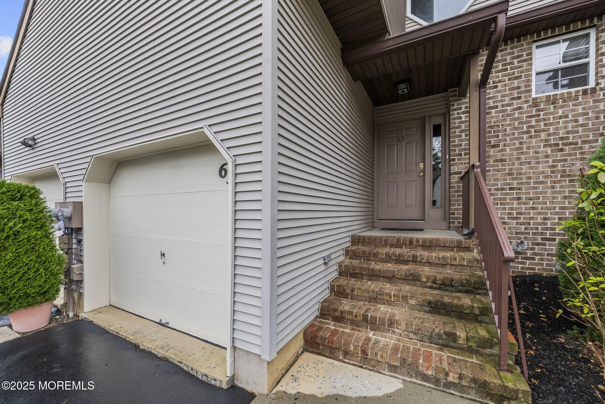 63 Atrium Way, Unit 63 Manalapan, NJ 07726 - Photo 5 of 40 a view of a entryway of the house