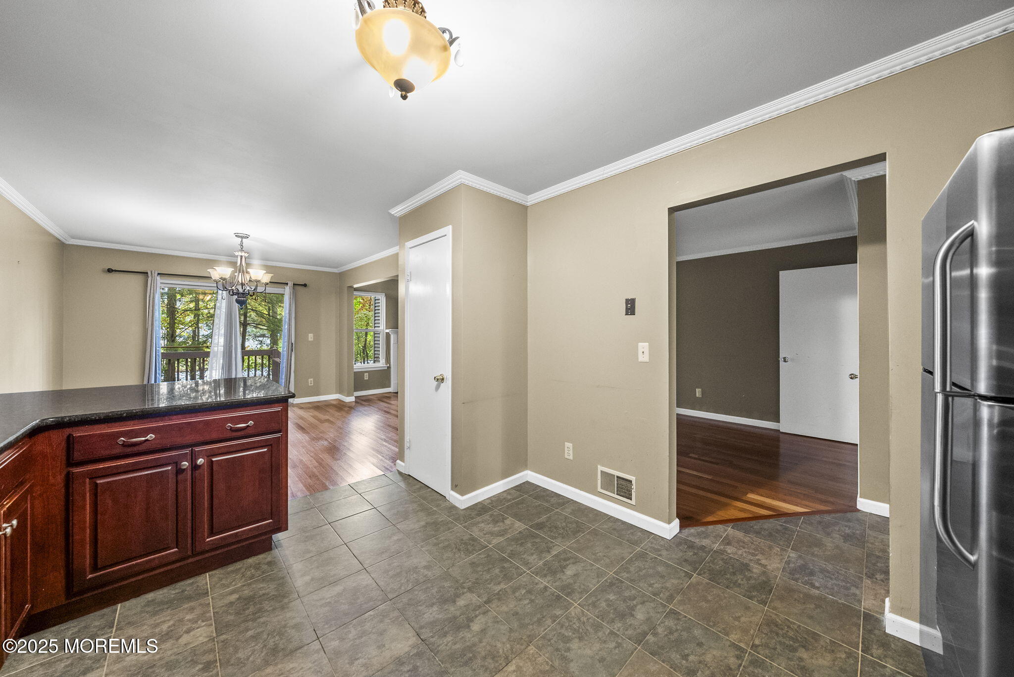 63 Atrium Way, Unit 63 Manalapan, NJ 07726 - Photo 9 of 40 a spacious bathroom with a sink and a mirror