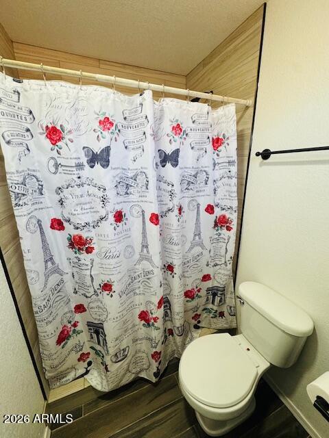 1130 East 4th Street Douglas, AZ 85607 - Photo 16 of 19 a bathroom with a sink toilet vanity and curtain