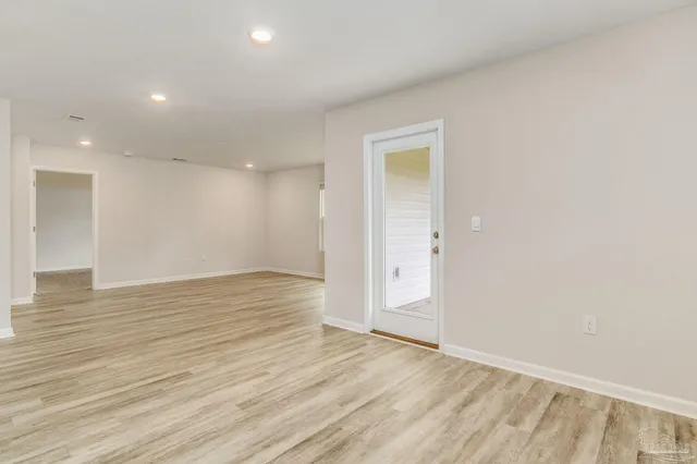 an empty room with windows