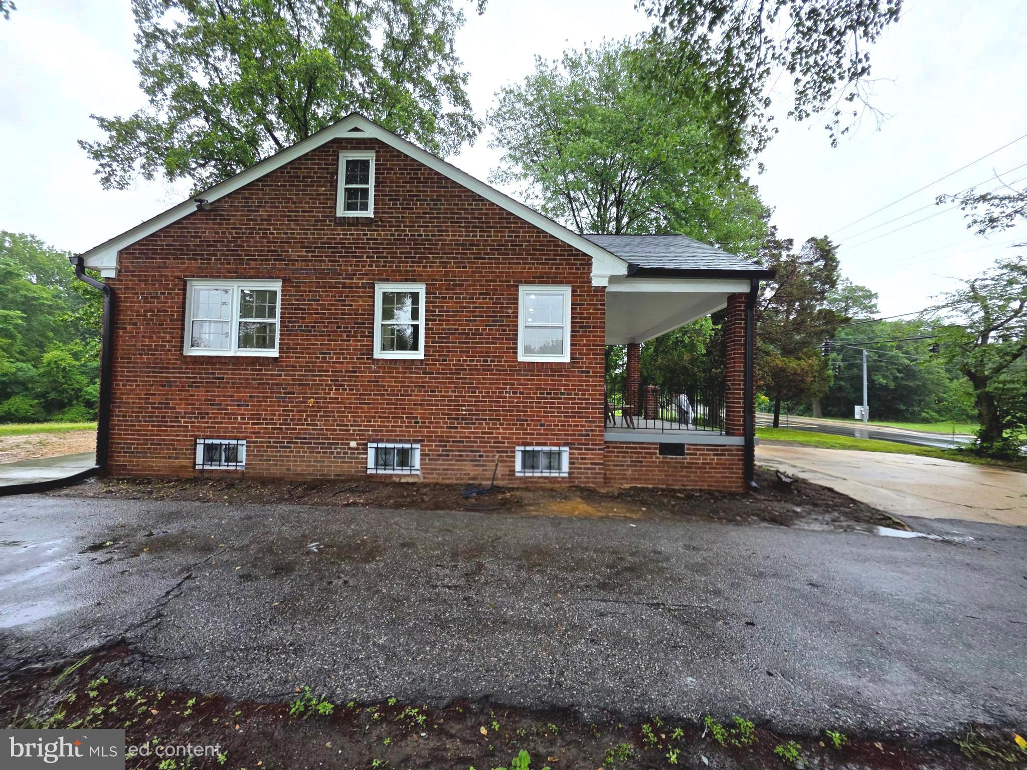 2206 Brinkley Road Fort Washington, MD 20744 - Photo 30 of 78 a front view of a house with a yard