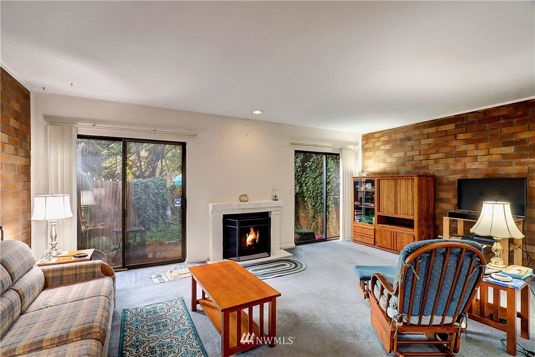 4404 Terrace Drive, Unit 3 Everett, WA 98203 - Photo 2 of 18 a living room with furniture and a fireplace
