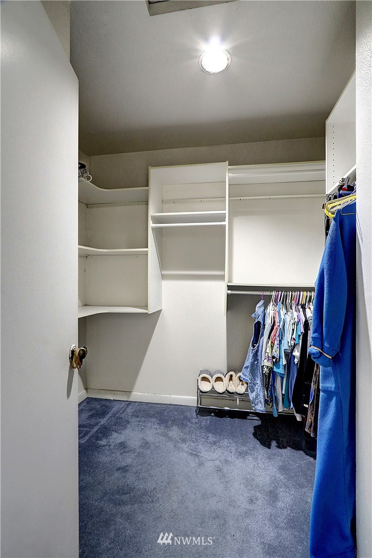 4404 Terrace Drive, Unit 3 Everett, WA 98203 - Photo 12 of 18 a view of walk in closet with clothes and shoes