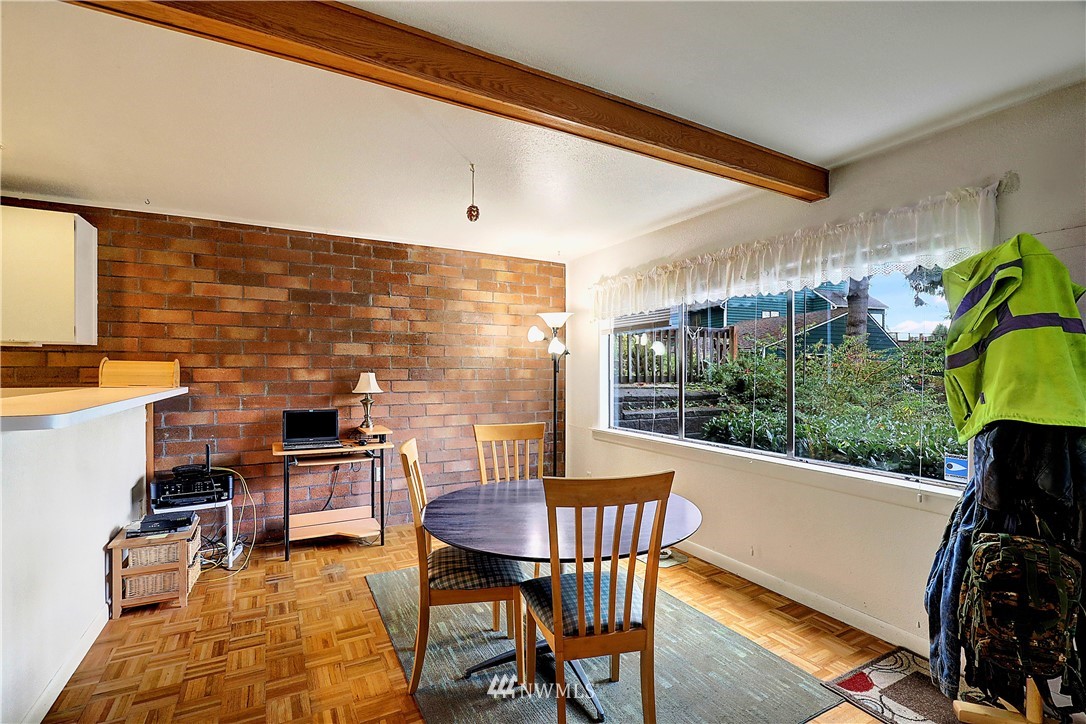 4404 Terrace Drive, Unit 3 Everett, WA 98203 - Photo 14 of 18 a view of a dining room with furniture window and outside view