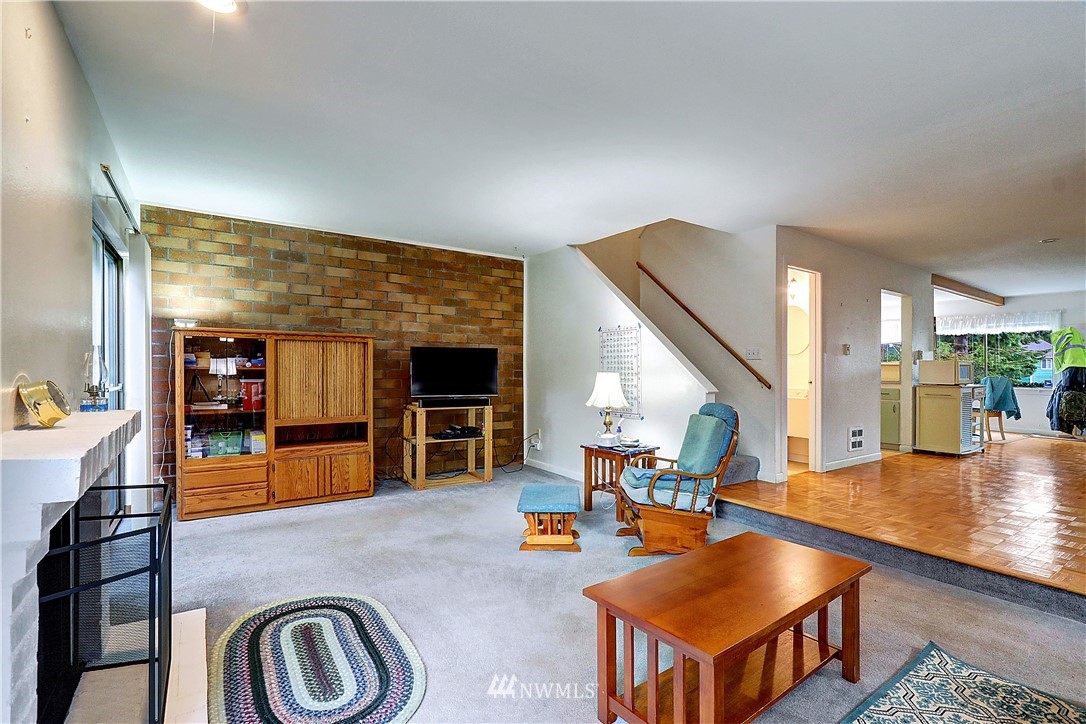 4404 Terrace Drive, Unit 3 Everett, WA 98203 - Photo 3 of 18 a living room with furniture pool table and flat screen tv