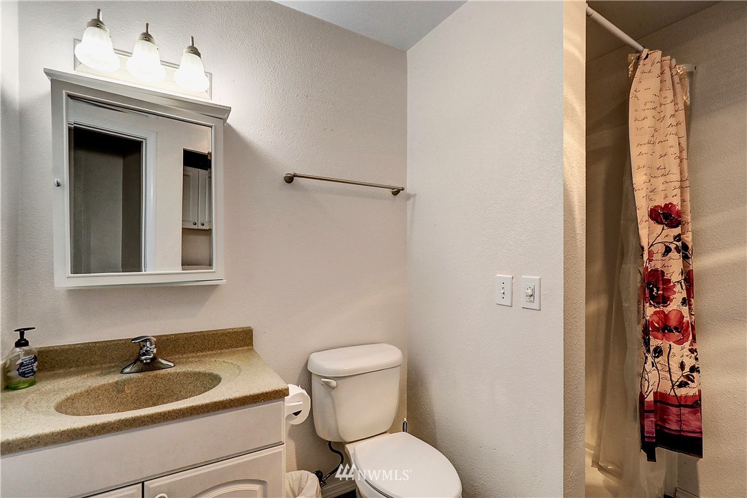 4404 Terrace Drive, Unit 3 Everett, WA 98203 - Photo 8 of 18 a bathroom with a sink toilet and shower