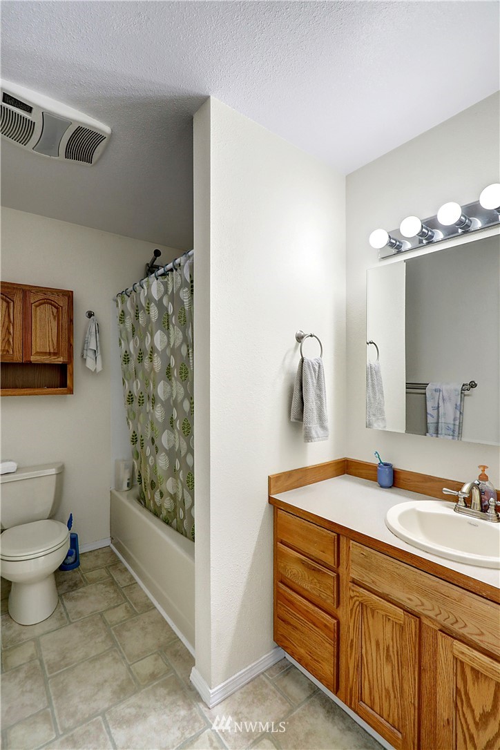 4404 Terrace Drive, Unit 3 Everett, WA 98203 - Photo 10 of 18 a spacious bathroom with a sink toilet and shower