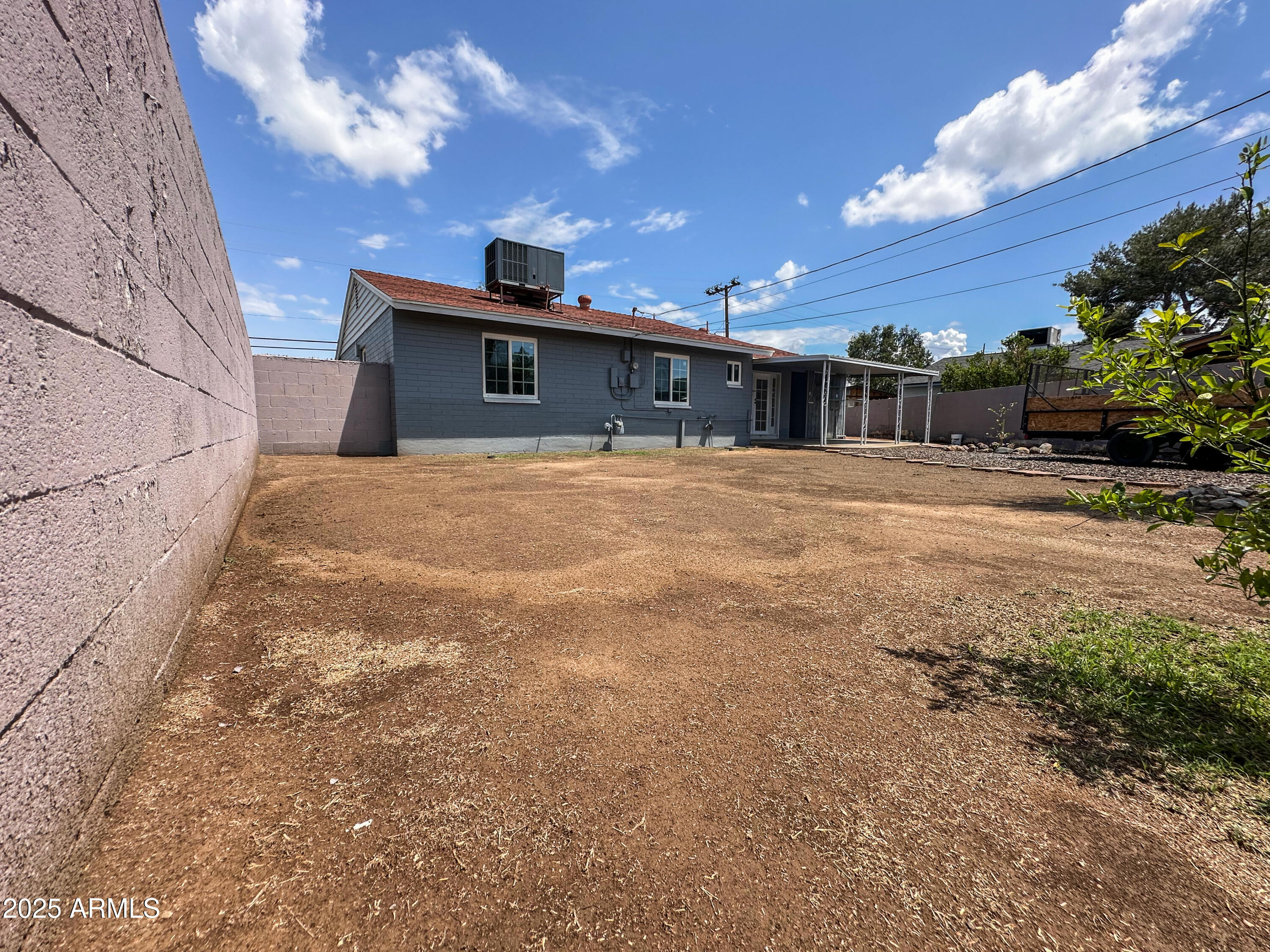 2928 North 37th Avenue Phoenix, AZ 85019 - Photo 13 of 13 a view of a large house with a street