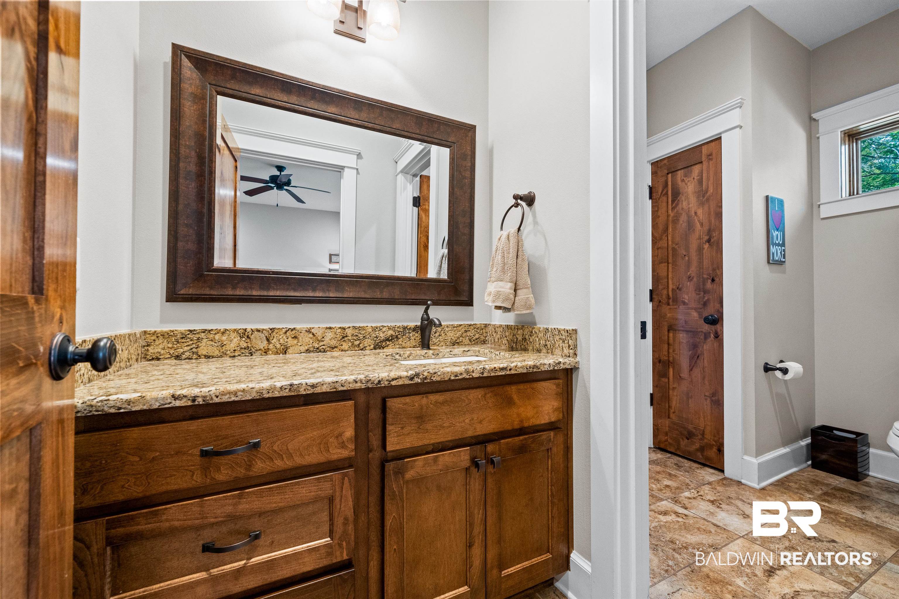 47252 Emmons Road Bay Minette, AL 36507 - Photo 28 of 50 Bathroom featuring vanity and ceiling fan